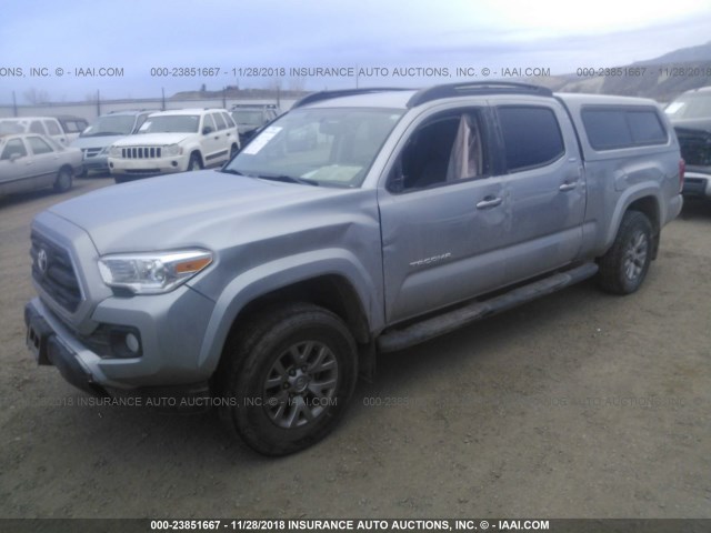 3TMDZ5BN8GM008853 - 2016 TOYOTA TACOMA DBL CAB/SR5/TRD SPORT/OR SILVER photo 2