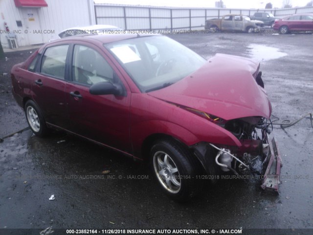 1FAFP34N05W318627 - 2005 FORD FOCUS ZX4 RED photo 1