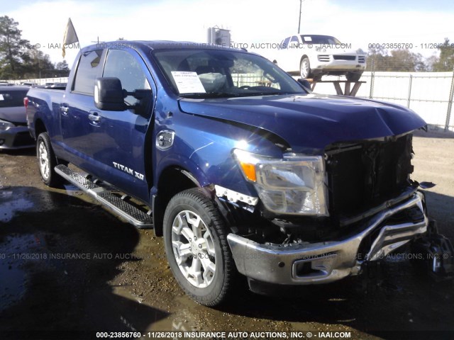 1N6BA1F28GN517335 - 2016 NISSAN TITAN XD SL/PLATINUM RESERVE BLUE photo 1