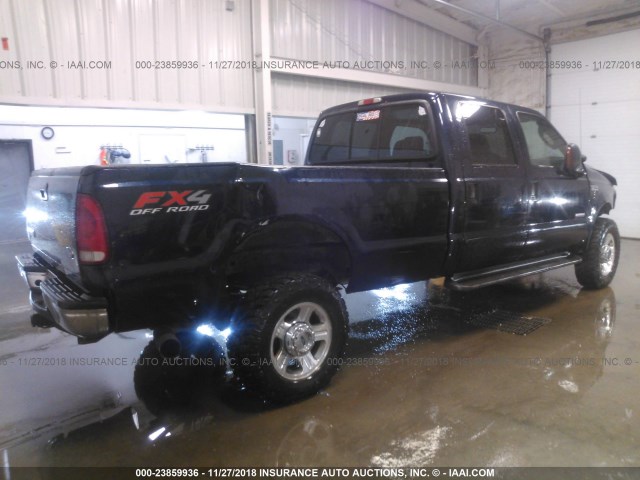 1FTWW31P05EC54856 - 2005 FORD F350 SRW SUPER DUTY Dark Blue photo 4