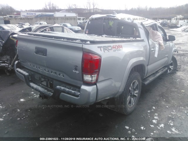 5TFCZ5AN2GX017717 - 2016 TOYOTA TACOMA DBL CAB/SR/SR5/TRD SPT/OR SILVER photo 4