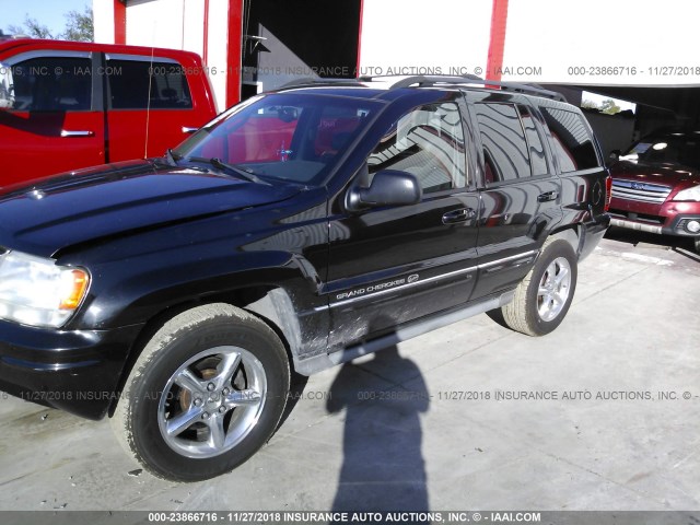 1J8GW68J74C108125 - 2004 JEEP GRAND CHEROKEE OVERLAND BLACK photo 2