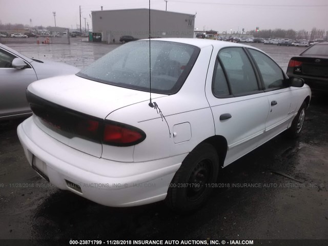 3G2JB5245XS838303 - 1999 PONTIAC SUNFIRE SE WHITE photo 4