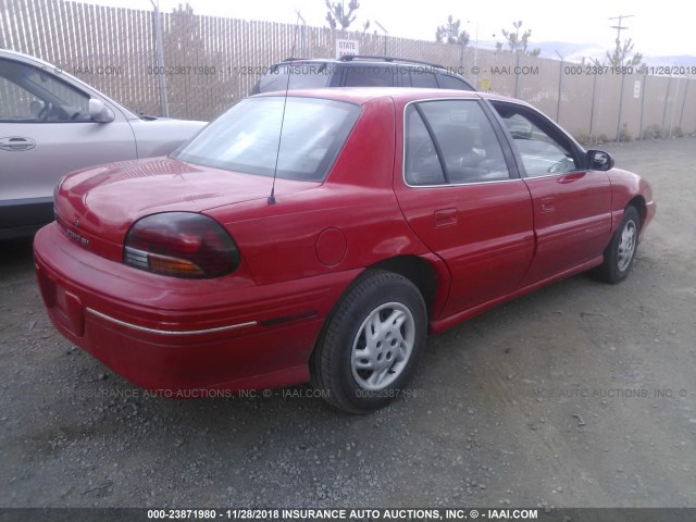 1G2NE52T5WC700524 - 1998 PONTIAC GRAND AM SE RED photo 4