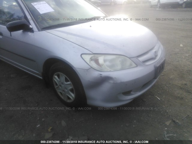 2HGES16304H547893 - 2004 HONDA CIVIC DX VP Gümüş foto 6