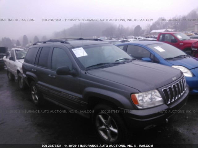 1J8GW68J42C152788 - 2002 JEEP GRAND CHEROKEE OVERLAND BLACK photo 1