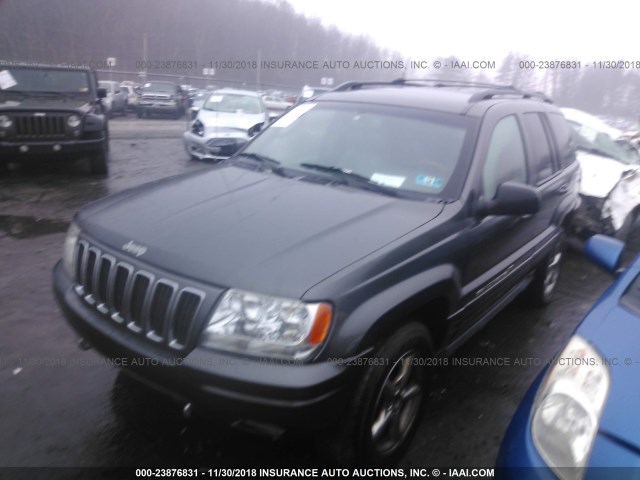 1J8GW68J42C152788 - 2002 JEEP GRAND CHEROKEE OVERLAND BLACK photo 2