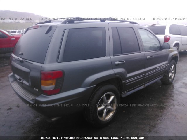 1J8GW68J42C152788 - 2002 JEEP GRAND CHEROKEE OVERLAND BLACK photo 4