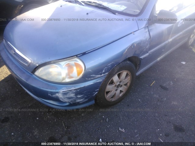 KNADC123126141372 - 2002 KIA RIO BLUE photo 6