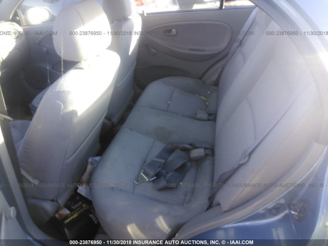 KNADC123126141372 - 2002 KIA RIO BLUE photo 8