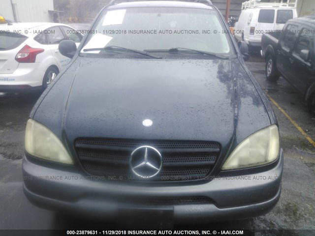 4JGAB54E4XA106730 - 1999 MERCEDES-BENZ ML 320 Dark Blue photo 6