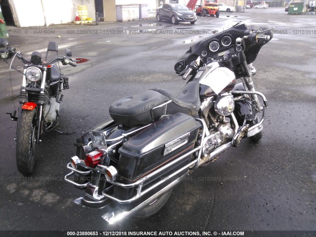 1HD1FCW112Y635106 - 2002 HARLEY-DAVIDSON FLHTCUI BLACK photo 4