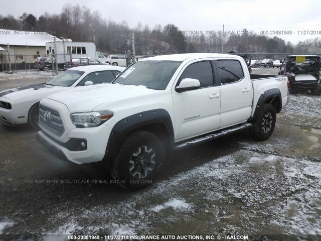 5TFCZ5AN2HX052047 - 2017 TOYOTA TACOMA DBL CAB/SR/TRDSPT/OR/PRO WHITE photo 2