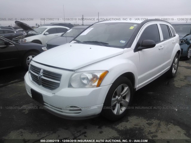 1B3CB3HAXBD254799 - 2011 DODGE CALIBER MAINSTREET WHITE photo 2