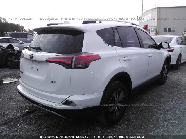 JTMWFREV3JD123612 - 2018 TOYOTA RAV4 ADVENTURE/XLE WHITE photo 4