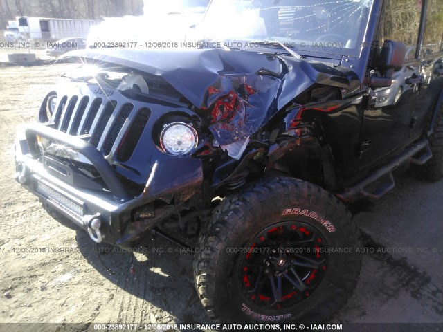 1C4BJWEG8CL286956 - 2012 JEEP WRANGLER UNLIMITE SAHARA BLACK photo 6