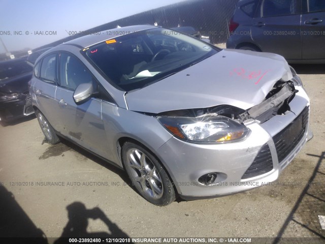 1FAHP3N28CL403016 - 2012 FORD FOCUS TITANIUM SILVER photo 1