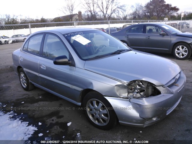 KNADC125546343278 - 2004 KIA RIO SILVER photo 1