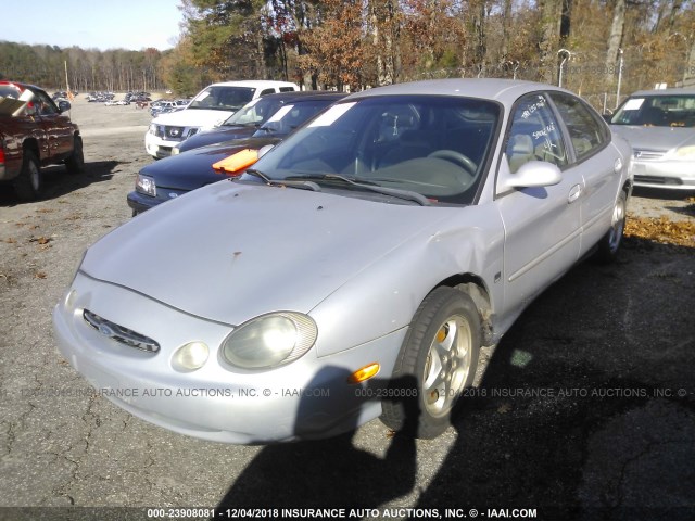 1FAFP53SXXA326561 - 1999 FORD TAURUS SE/COMFORT/SPORT SILVER photo 2