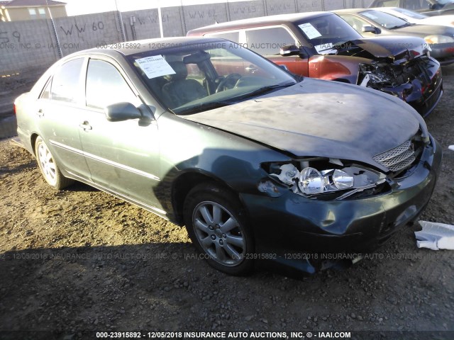 JTDBF30K720041240 - 2002 TOYOTA CAMRY LE/XLE/SE GREEN photo 1