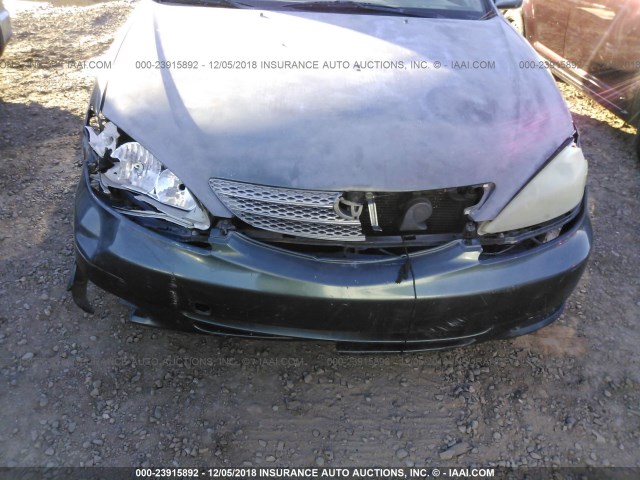 JTDBF30K720041240 - 2002 TOYOTA CAMRY LE/XLE/SE GREEN photo 6