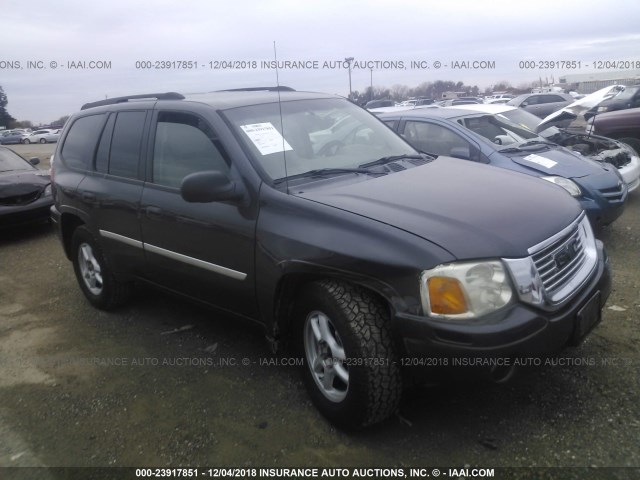 1GKDT13S272213725 - 2007 GMC ENVOY GRAY photo 1