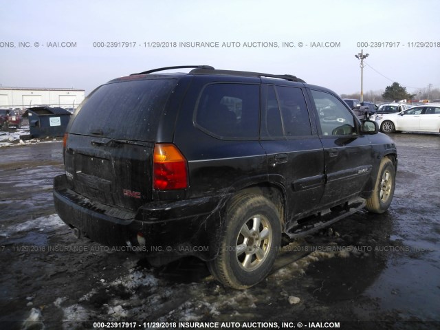 1GKDT13S922436384 - 2002 GMC ENVOY BLACK photo 4