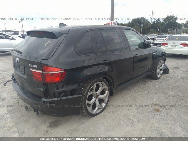 5YMGY0C58BLK26701 - 2011 BMW X5 M BLACK photo 4