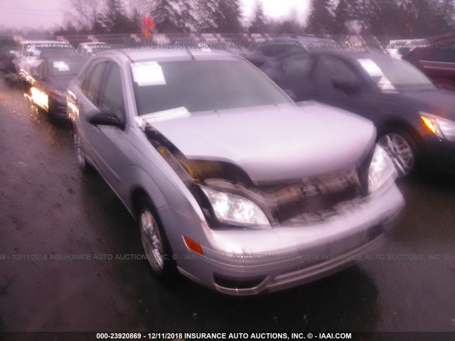 1FAFP34N85W289118 - 2005 FORD FOCUS ZX4 SILVER photo 1