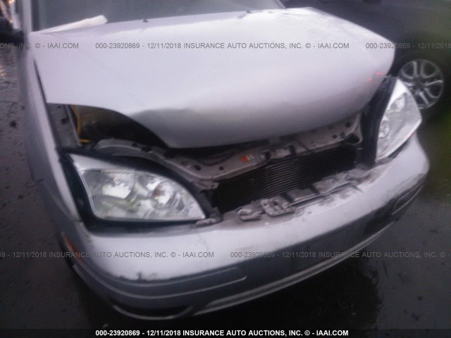 1FAFP34N85W289118 - 2005 FORD FOCUS ZX4 SILVER photo 6