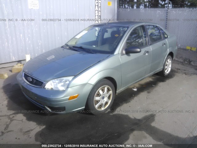 1FAHP34N85W266723 - 2005 FORD FOCUS ZX4 BLUE photo 2