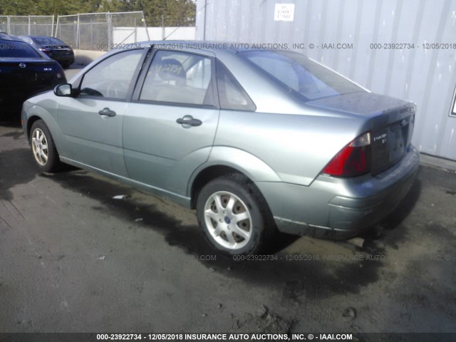 1FAHP34N85W266723 - 2005 FORD FOCUS ZX4 BLUE photo 3