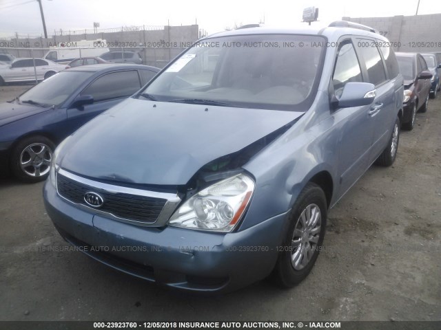 KNDMG4C70C6418315 - 2012 KIA SEDONA LX BLUE photo 6