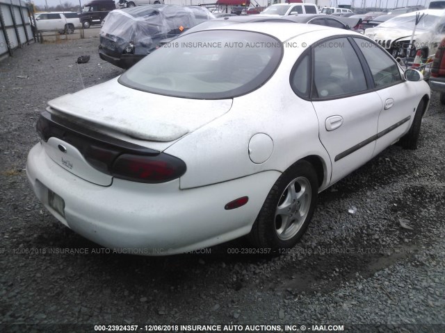 1FAFP53S9XA307869 - 1999 FORD TAURUS SE/COMFORT/SPORT WHITE photo 4