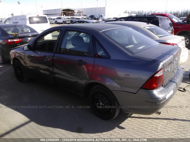 1FAFP34N46W228429 - 2006 FORD FOCUS ZX4 GRAY photo 3