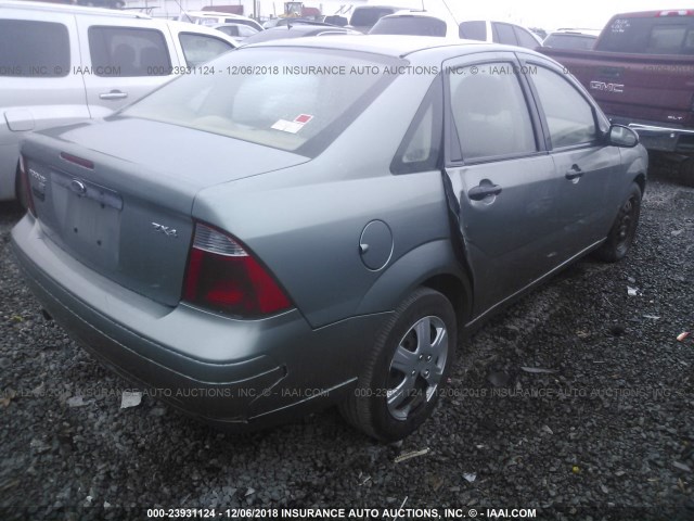 1FAFP34N06W128392 - 2006 FORD FOCUS ZX4 Light Blue photo 4