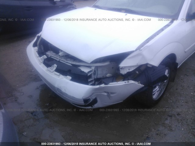 1FAFP34NX7W183109 - 2007 FORD FOCUS ZX4/S/SE/SES WHITE photo 6