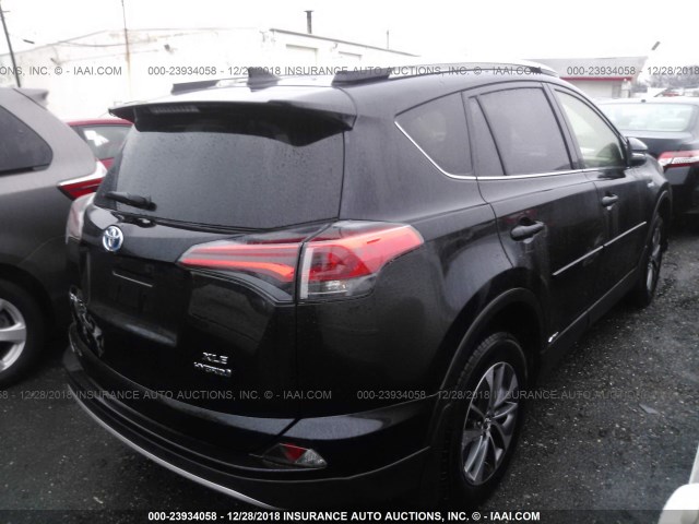 JTMRJREVXGD042000 - 2016 TOYOTA RAV4 HV XLE BLACK photo 4