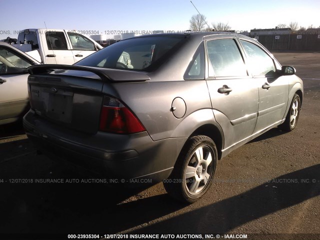 1FAHP34N57W315427 - 2007 FORD FOCUS ZX4/S/SE/SES GRAY photo 4