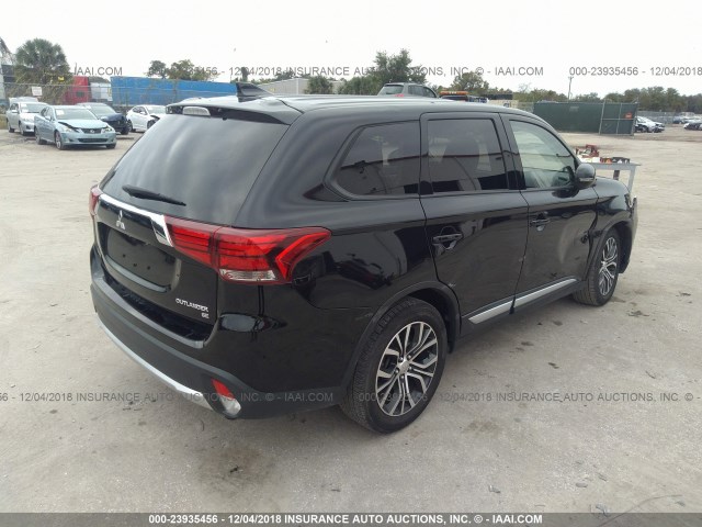 JA4AD3A31JZ016640 - 2018 MITSUBISHI OUTLANDER SE/SEL BLACK photo 4