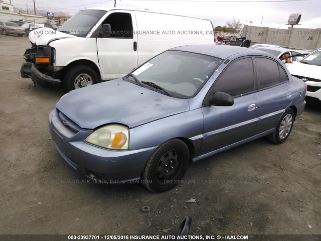 KNADC125136276211 - 2003 KIA RIO BLUE photo 2