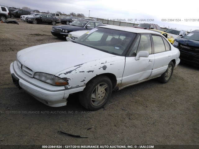 1G2HX53LXP1262845 - 1993 PONTIAC BONNEVILLE SE WHITE photo 2