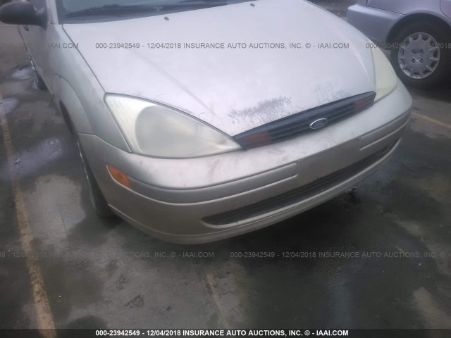 1FAFP3835YW109557 - 2000 FORD FOCUS ZTS BROWN photo 6