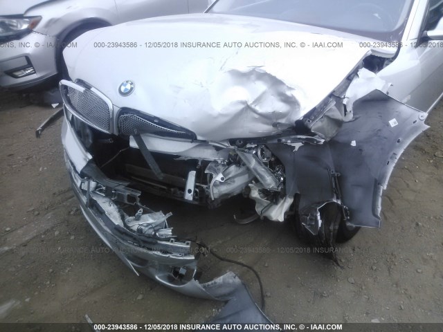 WBAHN83577DT69173 - 2007 BMW 750 SILVER photo 6