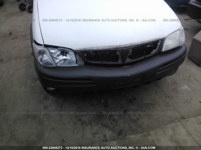 1GMDX03EX3D229976 - 2003 PONTIAC MONTANA WHITE photo 6