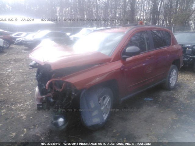 1J4NT4FB1AD537803 - 2010 JEEP COMPASS SPORT ORANGE photo 2