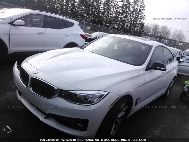 WBA3X9C52ED152895 - 2014 BMW 335 XIGT WHITE photo 2