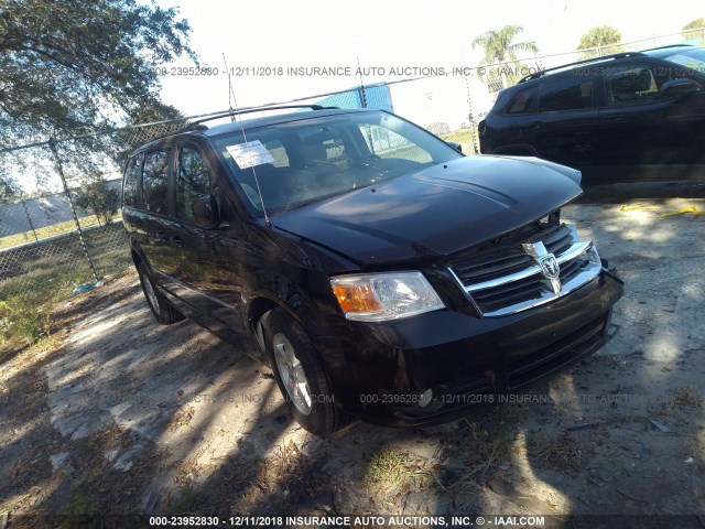 2D4RN5D15AR389978 - 2010 DODGE GRAND CARAVAN SXT BLACK photo 1