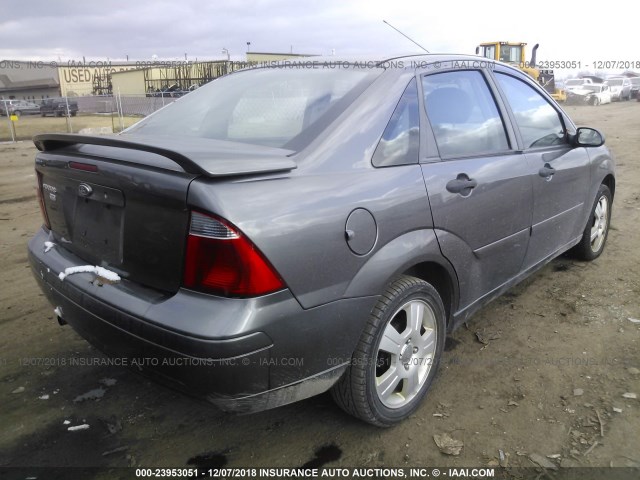 1FAHP34NX7W252390 - 2007 FORD FOCUS ZX4/S/SE/SES GRAY photo 4