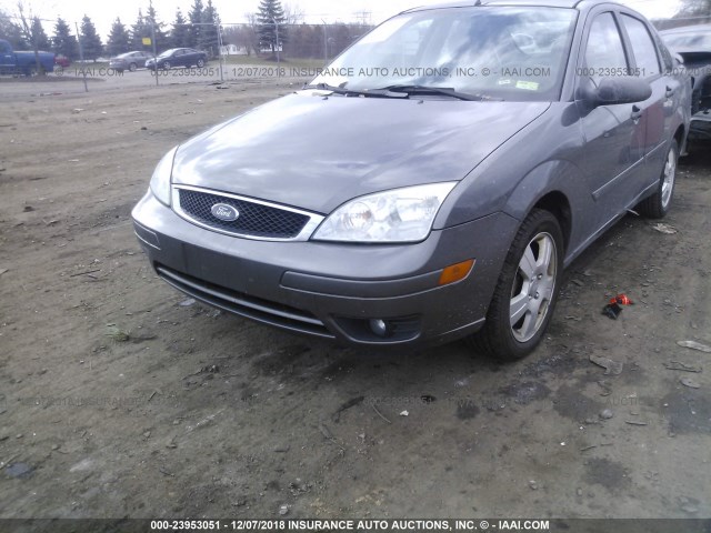 1FAHP34NX7W252390 - 2007 FORD FOCUS ZX4/S/SE/SES GRAY photo 6